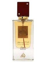 Rouge eau de parfum bottle, 60 ml, clear glass with gold label and dark red cap