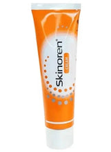 Skinoren anti-acne cream tube, orange and white, front view
