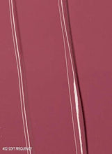 Soft pink lipstick swatch line on skin