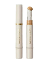 Beige concealer stick with sponge-head applicator