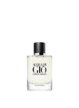 Eau de parfum bottle with black cap and clear glass body