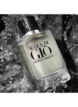 Eau de parfum bottle with black cap and clear glass body with front label