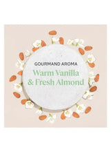 Warm vanilla & fresh almond fragrance round card with surrounding almonds