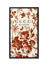 Gucci Bloom eau de parfum box with red floral pattern and black border label