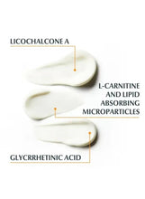 White cream swatches with ingredient labels