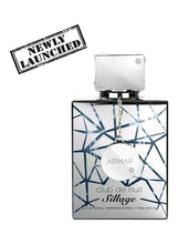 Eau de parfum bottle with silver cap and blue geometric pattern on label