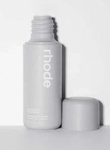 Skincare milk bottle with screw cap and matching open lid