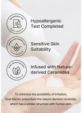 Creamy toner being smoothed on hands with the bottle nearby