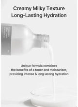 Creamy toner bottle dispensing milky liquid from a narrow nozzle