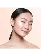 Sheer glow on face with light pink luminous finish