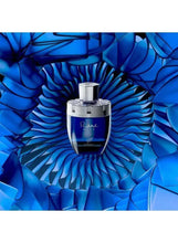 Rare Reef Afnan extrait de parfum bottle, silver cap and blue glass container