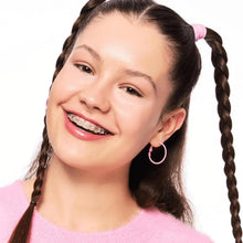 Woman with makeup including under-eye concealer near the eyes