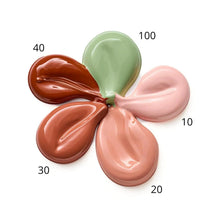 Under-eye concealer color swatches in multiple tones