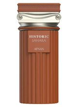 Extrait de parfum bottle, ribbed dark brown glass with silver top and label