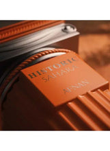 Extrait de parfum bottle label close-up: Historic Sahara and Afnan on warm brown