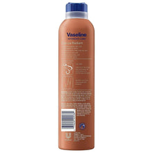 Vaseline cocoa radiant body spray bottle, front label view, tan-brown, blue cap