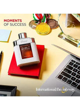 Eau de Parfum bottle on card with gold medallion and writing, Rasasi Al Wisam Day