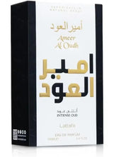 Perfume box with gold lettering and white label panel