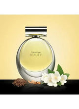 Calvin Klein Beauty eau de parfum bottle with spray top, pale yellow liquid