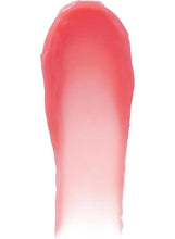 Pink tinted lip balm smear on applicator tip, glossy finish