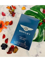 Eau de toilette bottle and blue box with Bentley wing logo and label text