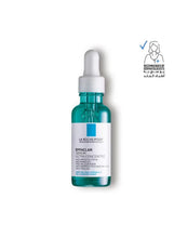 Anti-acne serum bottle in teal glass with white dropper cap, La Roche-Posay Effaclar