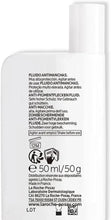 Sunscreen fluid bottle back label with directions and SPF 50+ 50 ml