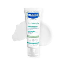 Emollient baby face cream tube with Mustela Stelatopia label and squeeze tip