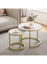 Round marble-pattern coffee table with white top and gold metal legs, two nested tables