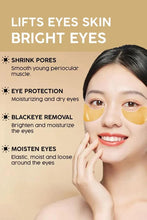 Gold under-eye gel patches placed under eyes on a person
