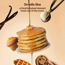Vanilla eau de parfum bottle pouring onto stacked pancakes with cookie and waffle