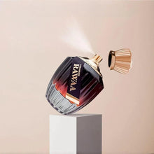 Eau de parfum bottle with rose-gold spray cap and dark glass in a tilted view