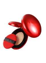 BB cream compact with open puff and beige cushion refill, red dome lid