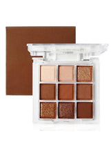 Warm 9-pan eyeshadow palette in clear case with matte and pearlescent shimmer shades
