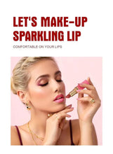 Model applying pink sparkly lipstick from gold-capped tube