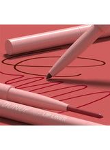 Velvet matte nude lip liner pens with pointed tips laid diagonally