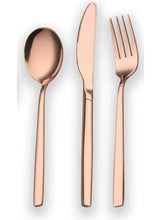 Rose gold stainless steel serving spoon, knife, and forks set, three-piece view