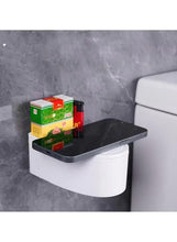 Black wall-mounted toilet ashtray with hinged lid and metal liner cup.