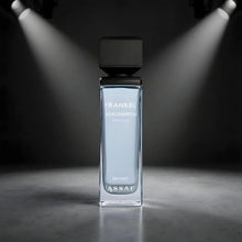 Perfume bottle with black cap, clear glass, front label visible.