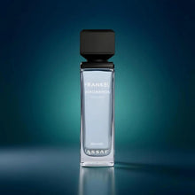 Perfume bottle with black cap and clear glass, centered front view.