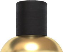 Amber Oud Gold eau de parfum bottle with black cap