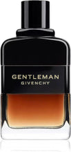 Eau de parfum bottle with black cap and amber label reading 'Gentleman Givenchy'