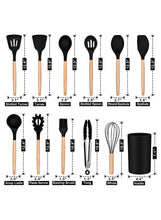 Assorted black silicone cooking utensils with wooden handles, including spoon and tongs