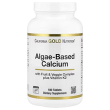 Algae-based calcium supplement bottle with gold band and white cap, 180 tablets