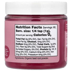 Organic beetroot powder in pink plastic jar with nutrition facts label