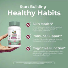 Multivitamin gummies bottle held in hand, green cap