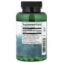 Swanson taurine 500 mg supplement bottle, green, with Supplement Facts label
