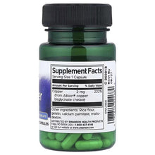 Swanson Albion Copper supplement facts label on bottle with black cap, green capsules