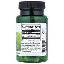 Herbal supplement bottle with Supplement Facts label and green veggie capsules inside