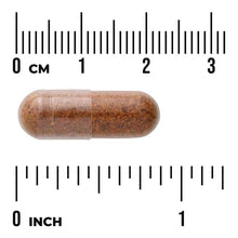 Brown translucent veggie supplement capsule with a seam across the center